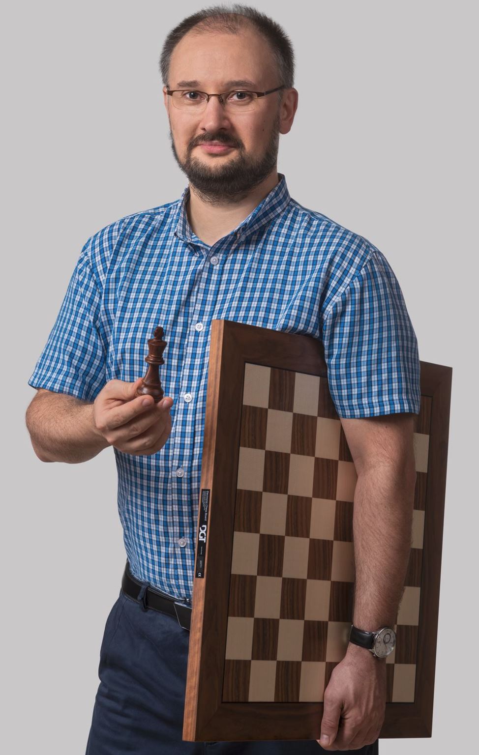 logo: trener szachów Janusz Sroka z Gliwic